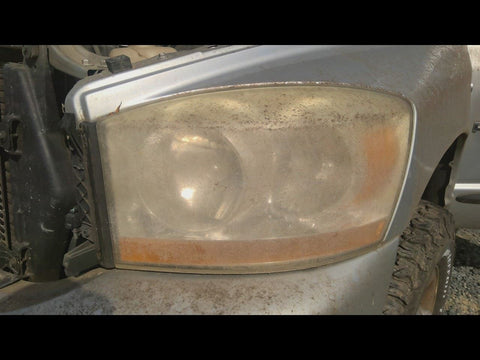 Driver Left Headlight Without Black Bezel Fits 06 DODGE 1500 PICKUP 4788550